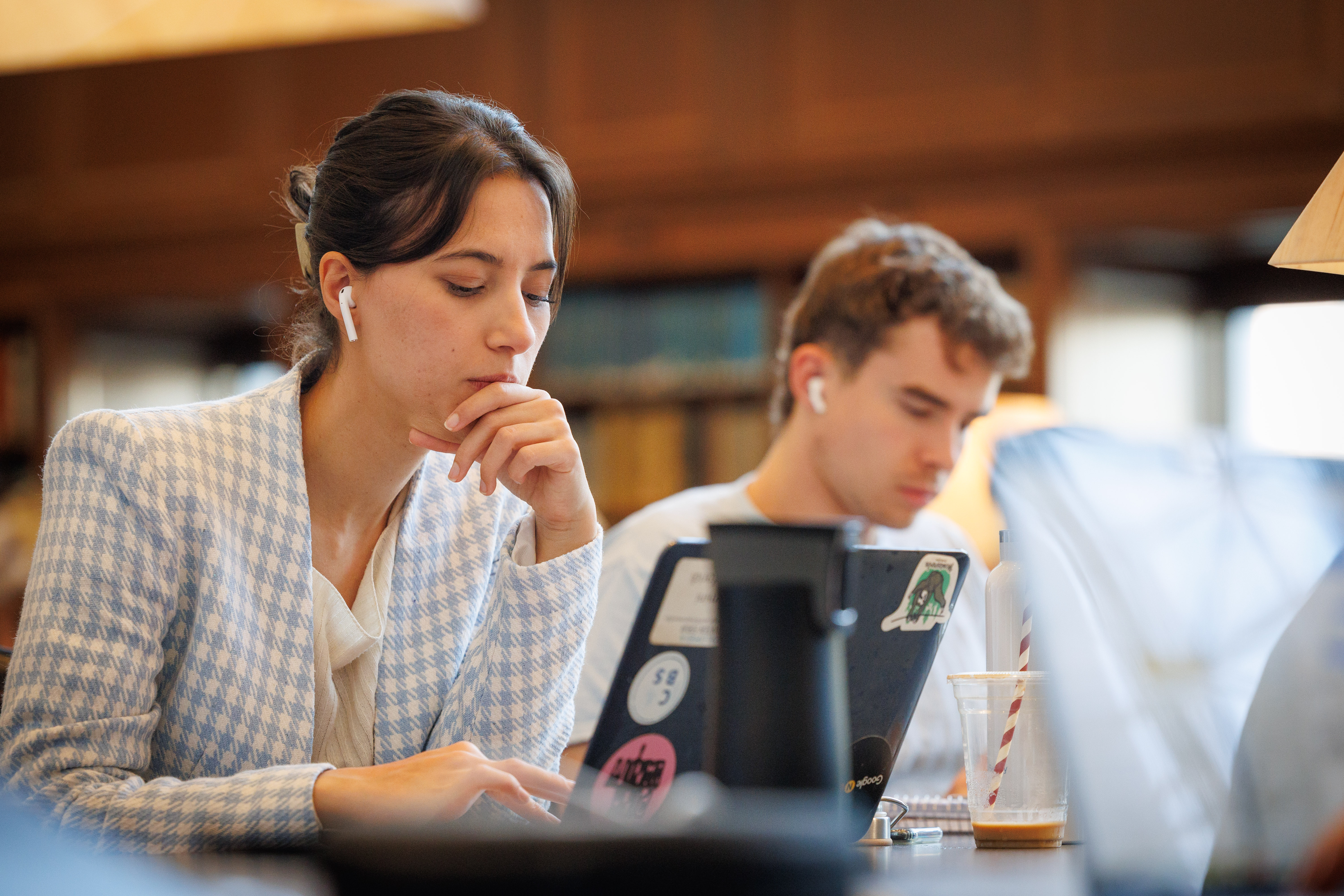 Students studying in library