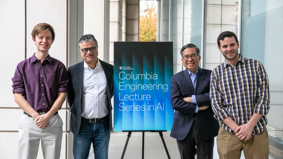 (L to R): Computer Science Assistant Professor John Hewitt, Vice Dean of Computing and AI Vishal Misra, Dean Shih-Fu Chang, and Electrical Engineering Assistant Professor Micah Goldblum standing next to a "Columbia Engineering Lecture Series in AI" banner